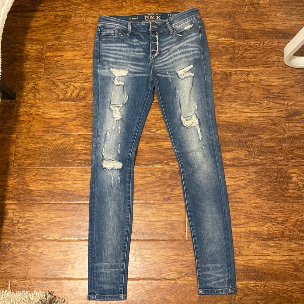 Buckle skinny jean